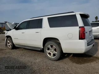 2016 Chevrolet Suburban LT with VIN 1GNSCHKC4GR111976, listed as a Copart auction lot 50751675 with 165,135 mi miles and Clean Title. Bid and sale history available at DreamBid. Image 2.