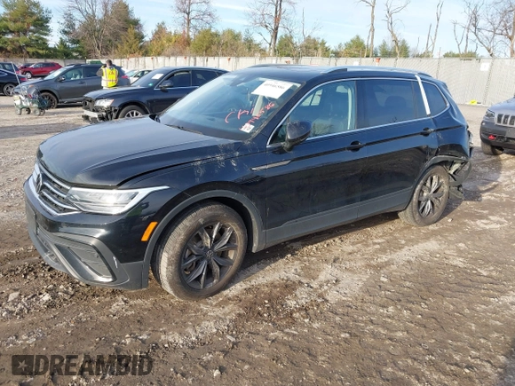 2022 Volkswagen Tiguan SE with VIN 3VV3B7AX8NM163352, listed as a IAAI auction lot 40946586 with 27,847 mi miles and . Bid and sale history available at DreamBid. Image 21.