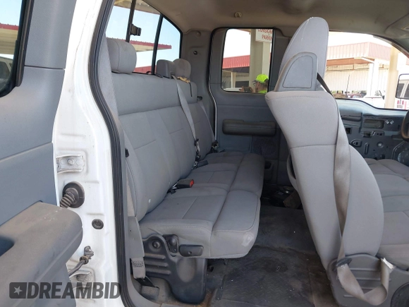 2005 Ford F-150 STX with VIN 1FTRX14W55FA03147, listed as a IAAI auction lot 42455231 with 210,999 mi miles and . Bid and sale history available at DreamBid. Image 8.