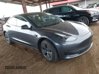2023 Tesla Model 3 with VIN 5YJ3E1EA6PF655510, listed as a IAAI auction lot 41948480 with 27,179 mi miles. Bid and sale history available at carsss.com. Image 1.
