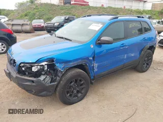 2019 Jeep Cherokee Trailhawk Elite with VIN 1C4PJMBN9KD258508, listed as a IAAI auction lot 42389006 with 106,480 mi miles and . Bid and sale history available at DreamBid. Image 2.