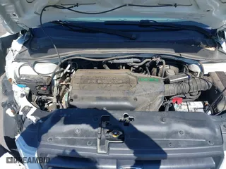2004 Honda Pilot EX with VIN 2HKYF18424H564482, listed as a IAAI auction lot 41868124 with 173,484 mi miles. Bid and sale history available at carsss.com. Image 10.
