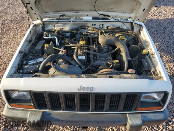 1997 Jeep Cherokee Sport z VIN 1J4FJ68S9VL594832, wystawiony jako Copart lot #53081675 z przebiegiem 167 028 mil mil oraz Czysty tytuł • Clean title. Historia ofert i sprzedaży dostępna na DreamBid. Obrazek 12.