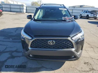 2024 Toyota Corolla Cross XLE with VIN 7MUDAAAGXRV073103, listed as a Copart auction lot 86753294 with 5,667 mi miles and Salvage title. Bid and sale history available at DreamBid. Image 5.