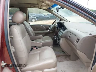 2002 Toyota Sienna LE with VIN 4T3ZF13C12U437425, listed as a IAAI auction lot 41157987 with 200,309 mi miles. Bid and sale history available at carsss.com. Image 5.