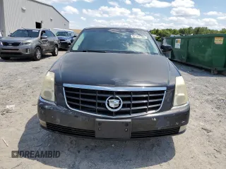 2010 Cadillac DTS 1SD z VIN 1G6KH5EY5AU110844, wystawiony jako Copart lot #57141785 z przebiegiem 173 657 mil mil oraz Tytuł czysty. Historia ofert i sprzedaży dostępna na DreamBid. Obrazek 5.