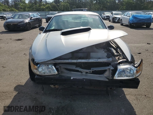 2004 Ford Mustang GT Deluxe with VIN 1FAFP42X74F208831, listed as a Copart auction lot 62903735 with 44,279 mi miles and Clean title. Bid and sale history available at DreamBid. Image 5.