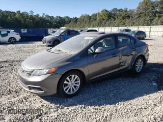 2012 Honda Civic EX-L with VIN 19XFB2F94CE048523, listed as a Copart auction lot 77019404 with 210,391 mi miles and Salvage Title. Bid and sale history available at DreamBid. Image 1.