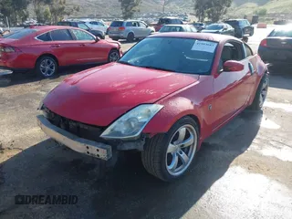 2007 Nissan 350Z Touring with VIN JN1BZ34E87M550297, listed as a IAAI auction lot 41993683 with 127,973 mi miles. Bid and sale history available at carsss.com. Image 2.