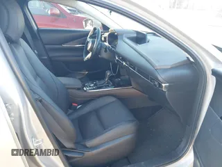 2024 Mazda CX-30 S Premium with VIN 3MVDMBDM9RM628162, listed as a IAAI auction lot 41262359 with 30,392 mi miles and . Bid and sale history available at DreamBid. Image 5.