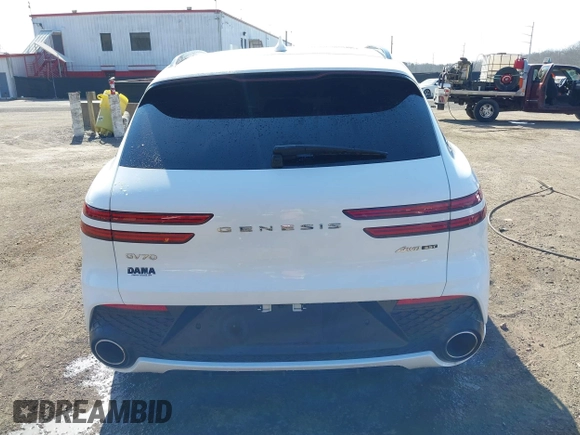 2022 Genesis GV70 Sport z VIN KMUMCDTC4NU039497, wystawiony jako IAAI lot #41668778 z przebiegiem 31 545 mil mil oraz . Historia ofert i sprzedaży dostępna na DreamBid. Obrazek 16.