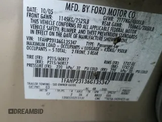 2006 Ford Ocean z VIN 1FAHP23136G135347, wystawiony jako Copart lot #80859664 z przebiegiem Nie podano mil oraz Szkody całkowita. Historia ofert i sprzedaży dostępna na DreamBid. Obrazek 12.