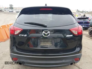 2014 Mazda CX-5 Touring z VIN JM3KE2CY3E0355332, wystawiony jako IAAI lot #42096306 z przebiegiem 108 198 mil mil oraz . Historia ofert i sprzedaży dostępna na DreamBid. Obrazek 15.
