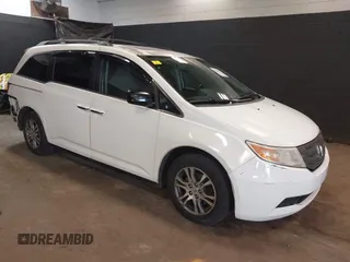 2013 Honda Odyssey EX-L with VIN 5FNRL5H66DB071151, listed as a IAAI auction lot 41914345 with 194,804 mi miles and . Bid and sale history available at carsss.com. Image 1.