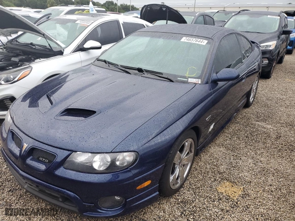 2005 Pontiac GTO with VIN 6G2VX12U15L381992, listed as a Copart auction lot 74657644 with NaN miles and Salvage Title. Bid and sale history available at carsss.com. Image 1.