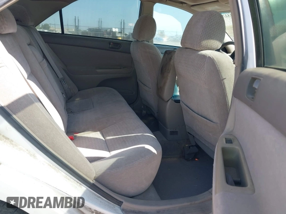 2002 Toyota Camry XLE z VIN 4T1BF32K22U032074, wystawiony jako IAAI lot #42153774 z przebiegiem 293 541 mil mil oraz . Historia ofert i sprzedaży dostępna na DreamBid. Obrazek 8.