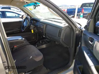2001 Dodge Dakota Sport with VIN 1B7HL2AN21S319390, listed as a IAAI auction lot 40836729 with 118,823 mi miles. Bid and sale history available at carsss.com. Image 5.