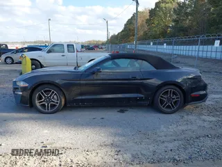 2021 Ford Mustang EcoBoost with VIN 1FATP8UH6M5103235, listed as a IAAI auction lot 40711543 with 52,470 mi miles. Bid and sale history available at carsss.com. Image 14.