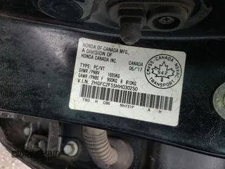 2017 Honda Civic LX z VIN 2HGFC2F55HH030250, wystawiony jako Copart lot #59228905 z przebiegiem 148 692 mil mil oraz Szkoda całkowita • Salvage title. Historia ofert i sprzedaży dostępna na DreamBid. Obrazek 13.