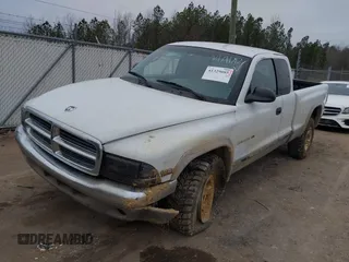 1999 Dodge Dakota SLT with VIN 1B7GG22X3XS223969, listed as a IAAI auction lot 41329085 with 185,859 mi miles and . Bid and sale history available at carsss.com. Image 6.