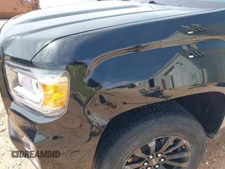 2021 GMC Canyon 2WD Elevation z VIN 1GTG5CEN4M1290149, wystawiony jako IAAI lot #41782863 z przebiegiem 33 807 mil mil oraz . Historia ofert i sprzedaży dostępna na DreamBid. Obrazek 18.