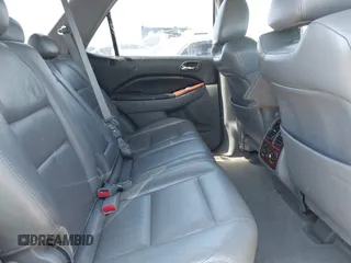 2005 Acura MDX with VIN 2HNYD18265H557415, listed as a IAAI auction lot 40155100 with 175,767 mi miles. Bid and sale history available at carsss.com. Image 8.