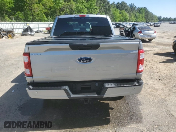 2023 Ford F-150 XL with VIN 1FTFW1E55PKF18784, listed as a Copart auction lot 52807315 with 15,284 mi miles and Salvage Title. Bid and sale history available at carsss.com. Image 6.