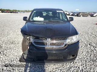 2015 Dodge Journey American Value with VIN 3C4PDCAB9FT692632, listed as a Copart auction lot 55261175 with 139,874 mi miles and Salvage Title. Bid and sale history available at DreamBid. Image 5.
