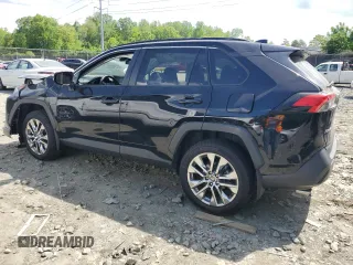 2021 Toyota RAV4 XLE Premium with VIN 2T3A1RFV3MC195877, listed as a Copart auction lot 55220955 with 92,679 mi miles and Salvage title. Bid and sale history available at DreamBid. Image 2.