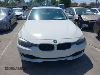 2013 BMW 3 Series 328i with VIN WBA3A5C55DF358287, listed as a IAAI auction lot 42027372 with 149,981 mi miles. Bid and sale history available at carsss.com. Image 6.