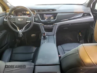 2023 Cadillac XT6 AWD Sport z VIN 1GYKPGRS6PZ108561, wystawiony jako Copart lot #71052284 z przebiegiem 31 496 mil mil oraz Szkoda całkowita • Salvage title. Historia ofert i sprzedaży dostępna na DreamBid. Obrazek 8.