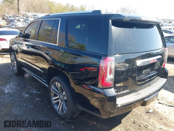 2018 GMC Yukon Denali with VIN 1GKS2CKJ2JR303356, listed as a IAAI auction lot 41768935 with 89,869 mi miles. Bid and sale history available at carsss.com. Image 3.