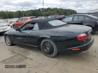 2006 Jaguar XK with VIN SAJDA42C462A44968, listed as a Copart auction lot 75758524 with 77,266 mi miles and Salvage Title. Bid and sale history available at carsss.com. Image 2.