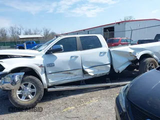 2013 Ram 2500 Laramie Longhorn with VIN 3C6UR5LL7DG522840, listed as a IAAI auction lot 41970385 with 145,144 mi miles and . Bid and sale history available at DreamBid. Image 14.