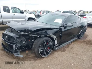 2015 Ford Mustang EcoBoost z VIN 1FA6P8TH6F5370313, wystawiony jako IAAI lot #42206594 z przebiegiem 76 769 mil mil oraz . Historia ofert i sprzedaży dostępna na DreamBid. Obrazek 17.