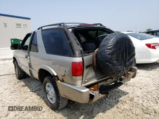 2000 Chevrolet Blazer LS z VIN 1GNCT18W3YK175871, wystawiony jako Copart lot #58230204 z przebiegiem Nie podano mil oraz Nie do naprawy • Non repairable. Historia ofert i sprzedaży dostępna na DreamBid. Obrazek 2.