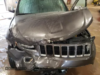 2014 Jeep Grand Cherokee Limited z VIN 1C4RJFBG3EC518921, wystawiony jako Copart lot #58147805 z przebiegiem 156 076 mil mil oraz Czysty tytuł • Clean title. Historia ofert i sprzedaży dostępna na DreamBid. Obrazek 12.