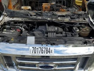 2011 Ford Econoline Passenger XL with VIN 1FBNE3BL5BDA78418, listed as a Copart auction lot 70176784 with Not Provided miles and Salvage Title. Bid and sale history available at DreamBid. Image 12.