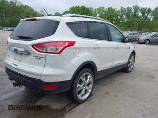 2016 Ford Escape Titanium with VIN 1FMCU9J96GUB97564, listed as a IAAI auction lot 42137663 with 269,009 mi miles. Bid and sale history available at carsss.com. Image 4.