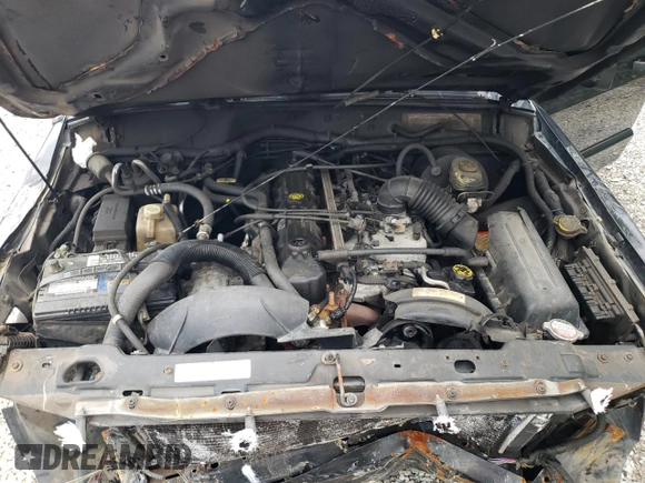 2001 Jeep Cherokee Sport с VIN 1J4FF48S31L615450, выставлен на аукционе Copart как лот 55835585 с пробегом 246 694 миль миль и Списание • Salvage title. История ставок и продаж доступна на DreamBid. Изображение 11.