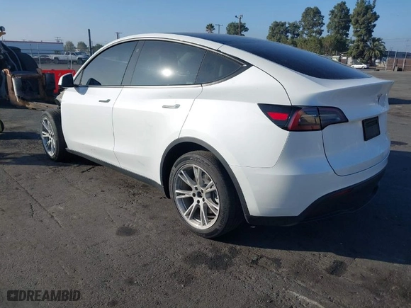 2023 Tesla Model Y Long Range with VIN 7SAYGDEE9PF618720, listed as a IAAI auction lot 41643062 with NaN miles. Bid and sale history available at carsss.com. Image 3.