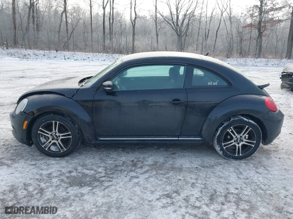 2012 Volkswagen Beetle 2.5L PZEV with VIN 3VWJP7AT8CM619137, listed as a IAAI auction lot 41195954 with 157,741 mi miles. Bid and sale history available at carsss.com. Image 14.