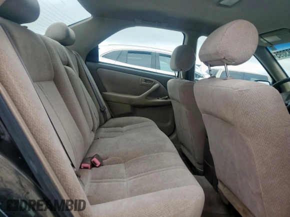 2001 Toyota Camry CE z VIN 4T1BG22K71U032545, wystawiony jako Copart lot #60883095 z przebiegiem 199 864 mil mil oraz Czysty tytuł • Clean title. Historia ofert i sprzedaży dostępna na DreamBid. Obrazek 10.