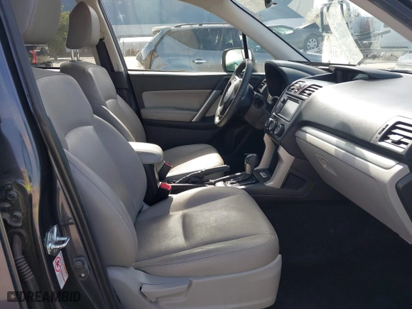 2015 Subaru Forester 2.5i Touring with VIN JF2SJAWC4FH523997, listed as a IAAI auction lot 41884674 with 175,127 mi miles. Bid and sale history available at carsss.com. Image 5.