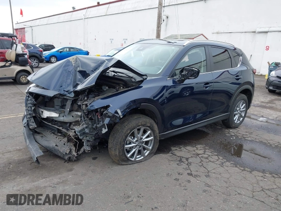 2022 Mazda CX-5 2.5 S Preferred Package with VIN JM3KFBCM6N0602773, listed as a IAAI auction lot 41762571 with 49,121 mi miles. Bid and sale history available at carsss.com. Image 22.