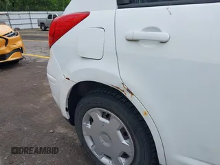 2012 Nissan Versa S z VIN 3N1BC1CP2CK299490, wystawiony jako IAAI lot #42259931 z przebiegiem 200 613 mil mil oraz . Historia ofert i sprzedaży dostępna na DreamBid. Obrazek 6.