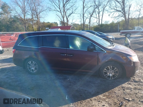 2012 Honda Odyssey EX-L with VIN 5FNRL5H60CB096691, listed as a IAAI auction lot 41824395 with 93,047 mi miles and . Bid and sale history available at DreamBid. Image 13.
