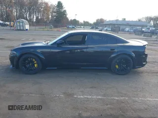 2020 Dodge Charger SRT Hellcat z VIN 2C3CDXL91LH128675, wystawiony jako IAAI lot #40805177 z przebiegiem 43 619 mil mil oraz . Historia ofert i sprzedaży dostępna na DreamBid. Obrazek 14.