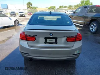 2015 BMW 3 Series 320i with VIN WBA3B1G58FNT03373, listed as a IAAI auction lot 41843859 with 98,439 mi miles. Bid and sale history available at carsss.com. Image 16.