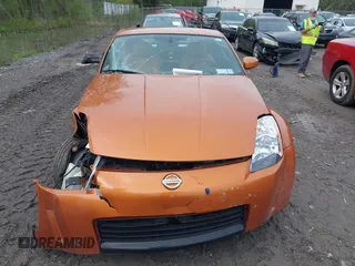 2003 Nissan 350Z Touring z VIN JN1AZ34E73T003839, wystawiony jako IAAI lot #42206083 z przebiegiem 50 919 mil mil oraz . Historia ofert i sprzedaży dostępna na DreamBid. Obrazek 12.